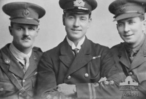 The ace Roderic Dallas, in the center, with two RNAS officers.