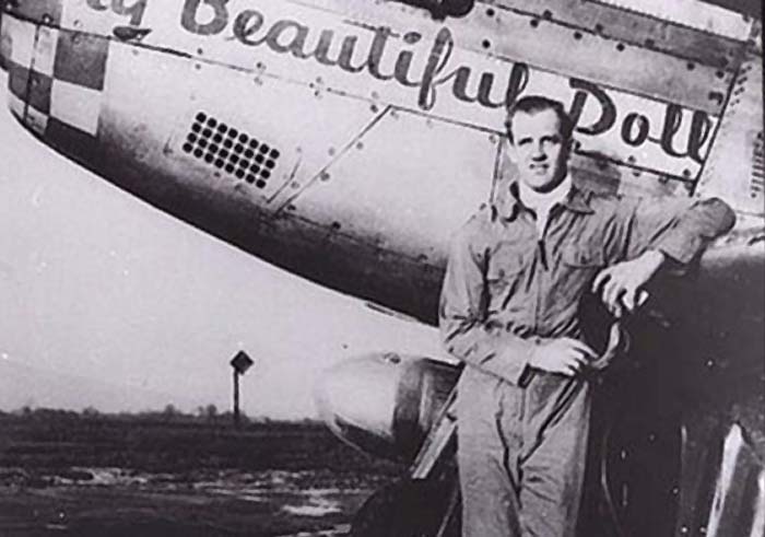 Jonh Landers and his aircraft with all his victories marked on the fuselage!