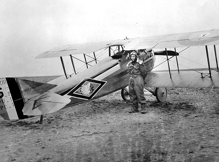 Robert Soubiran and his aircraft on a airfield.