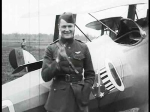 A smiling Rickenbacker, close to his airplane.