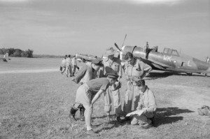 Pilots of No. 135 Squadron RAF at Chittagong, India, near the P-47 HB975 WK-L.